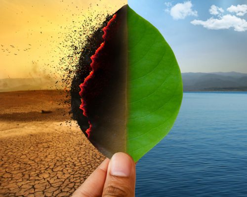 Climate change and Global warming concept. Burning leaf at land of cracked earth metaphor drought and Green leaf with river and beautiful clear sky metaphor Abundance of Nature.